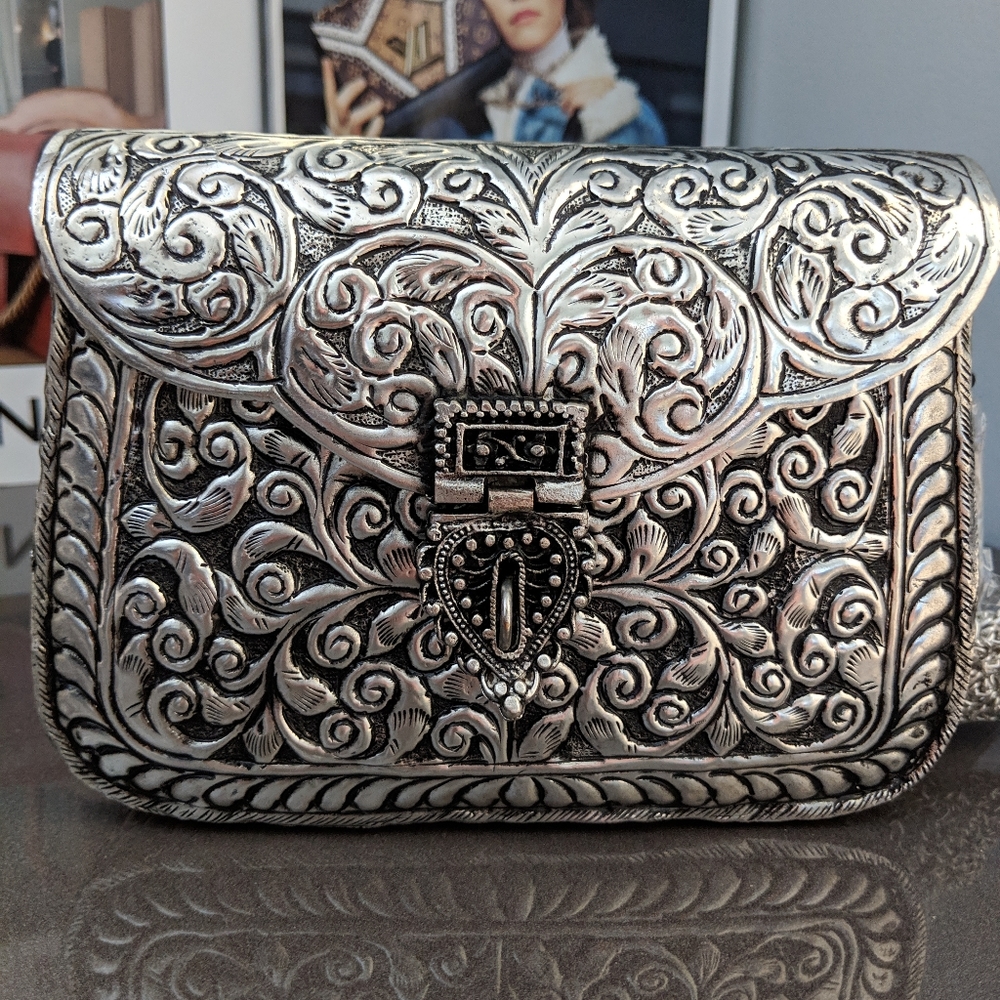 From St Xavier Atria Metal Clutch Anthropologie